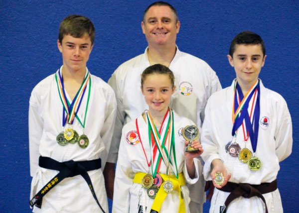 Cian Hogan (1st dan), Padraig Hassett (3rd kyu), and Michelle Hurley (7th kyu)