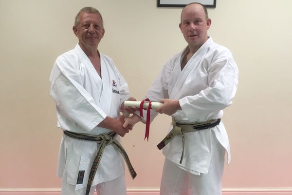 Sensei Matt Corrall awarded 5th Dan by Sensei Dave Hazard 7th Dan.